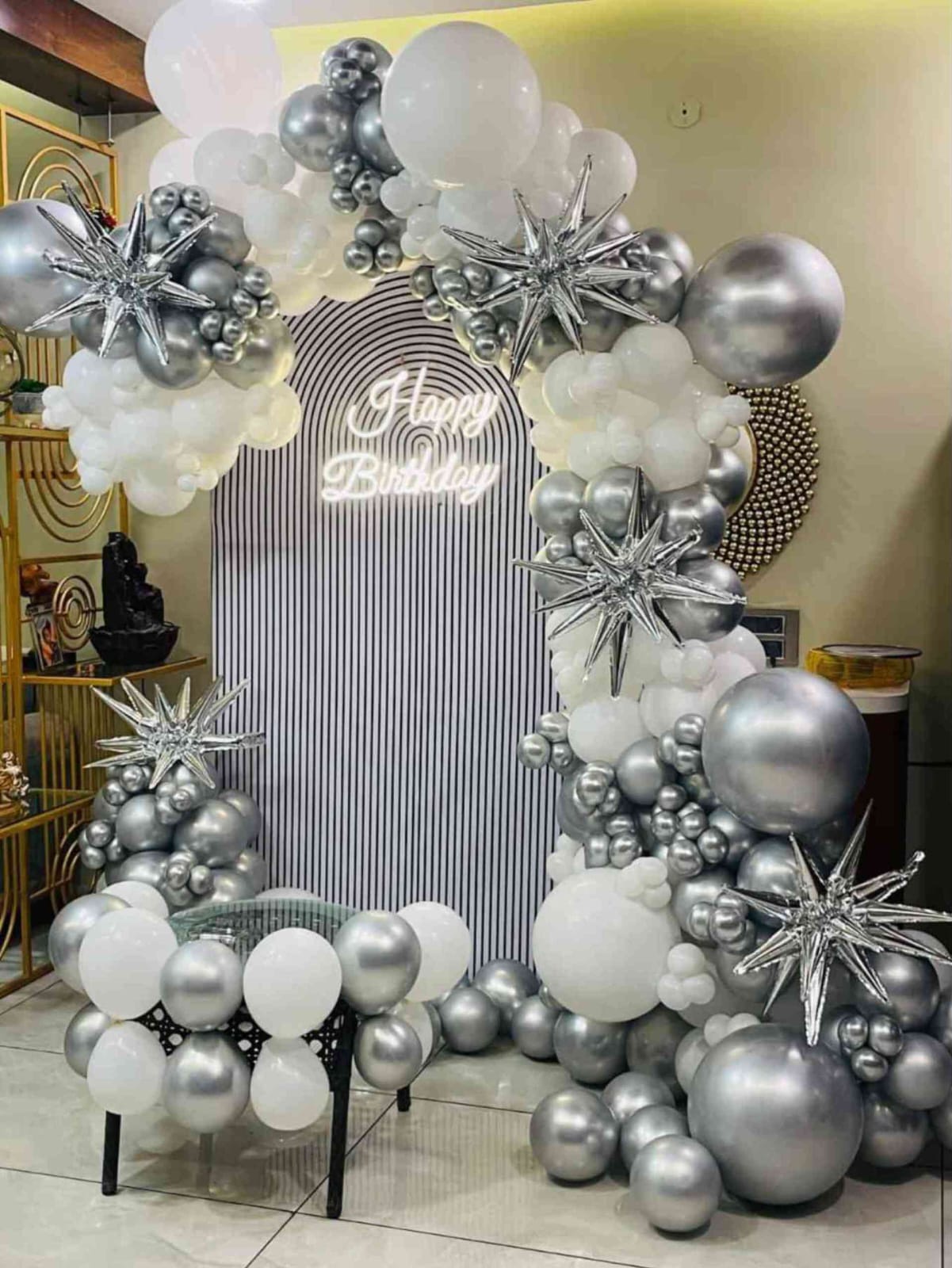 Modern Silver And White Birthday Balloon Arch With Neon Backdrop - birthday decoration by ARV Decor