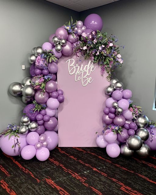 Lavender And Silver Bridal Shower Backdrop With Balloon Arch And Flowers - balloon and flower decoration by ARV Decor