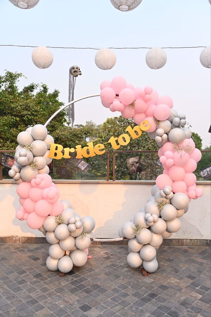 Pink And Silver Balloon Arch Bridal Shower Decor With Bride To Be Sign - balloon and flower decoration by ARV Decor