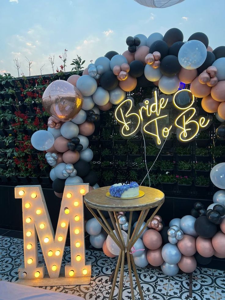 Modern Bride To Be Balloon Arch Decor In Black And Rose Gold With Neon Sign For Bridal Shower - balloon and flower decoration by ARV Decor