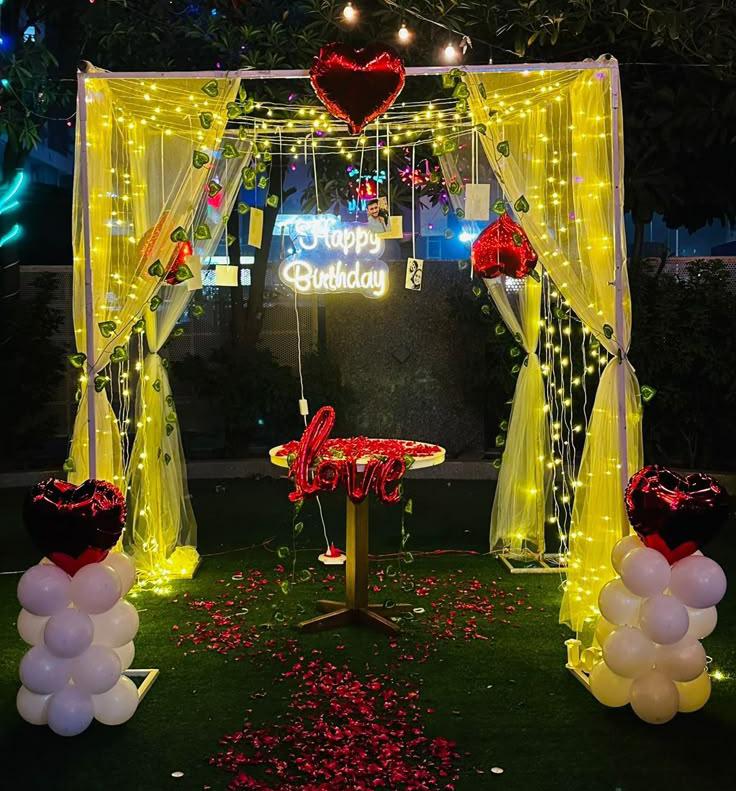 Romantic Red And Yellow Birthday Decoration With Lights And Heart Balloons - birthday decoration by ARV Decor