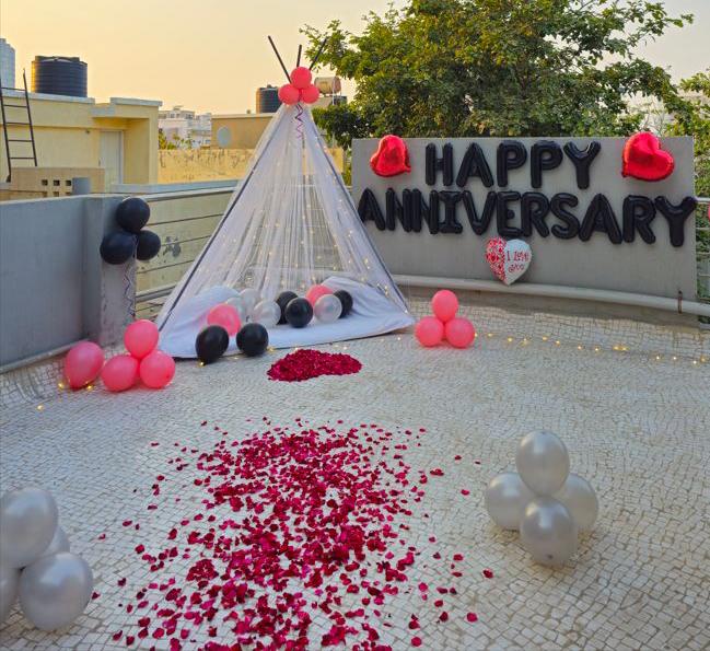 Romantic Red And Black Anniversary Decor With Teepee Tent And Rose Petal Path - anniversary room decoration by ARV Decor