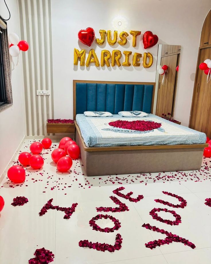 Romantic Just Married Room Decoration With Red Balloons And Rose Petals - anniversary room decoration by ARV Decor
