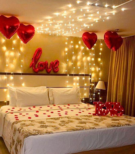 Romantic Anniversary Room Decor With Red Heart Balloons And Fairy Lights - anniversary room decoration by ARV Decor