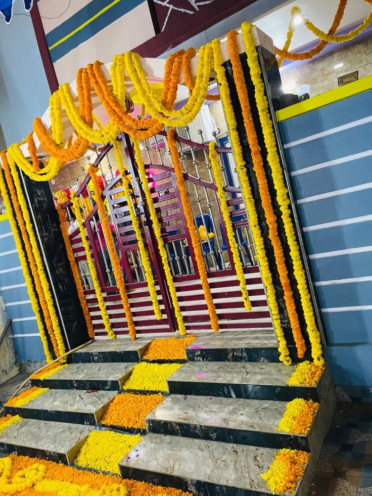 Traditional Yellow Orange Floral Gate Decoration For Home Entrance - balloon and flower decoration by ARV Decor